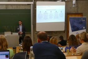 Photo of the participants of the networking event in a lecture theatre at THI